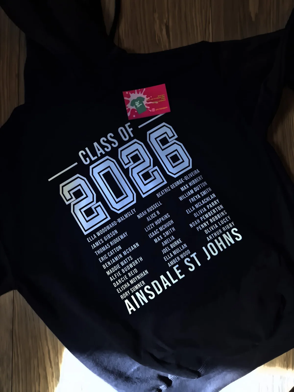 Navy Ainsdale St Johns Class of 2026 t-shirt with names in the back design