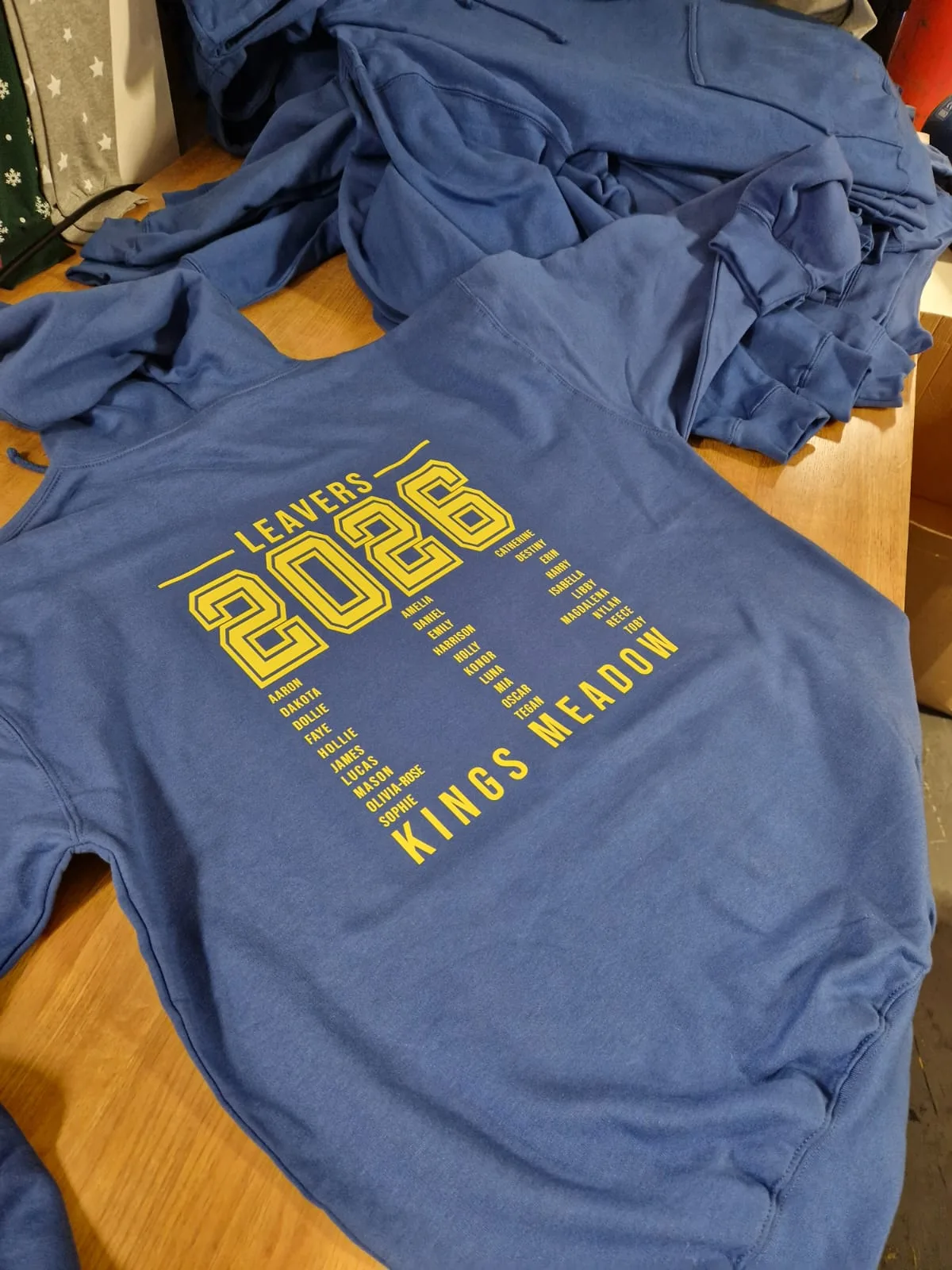 Blue Kings Meadow leavers t-shirt with yellow 2026 back design