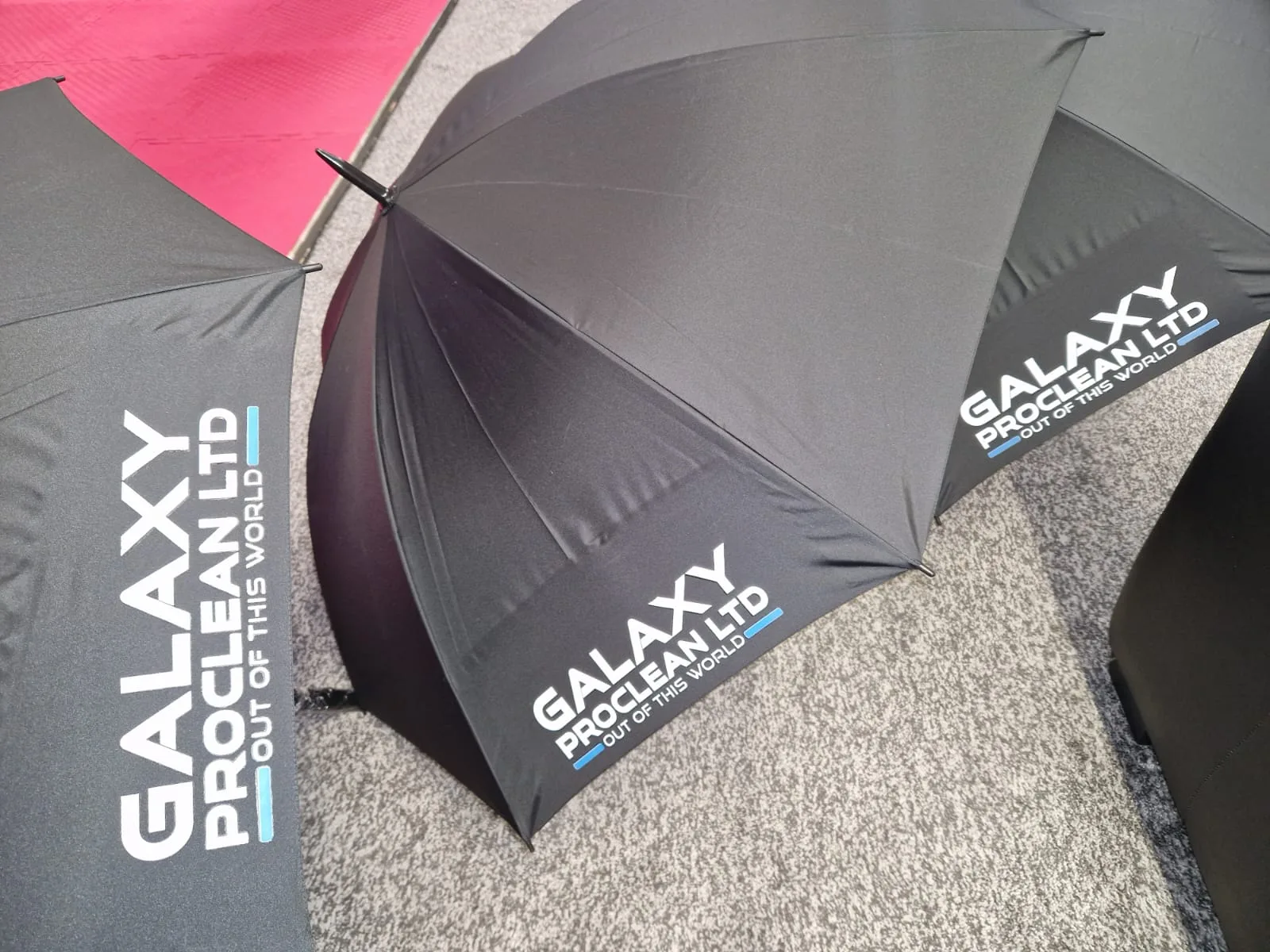 Black umbrella with Galaxy ProClean branding