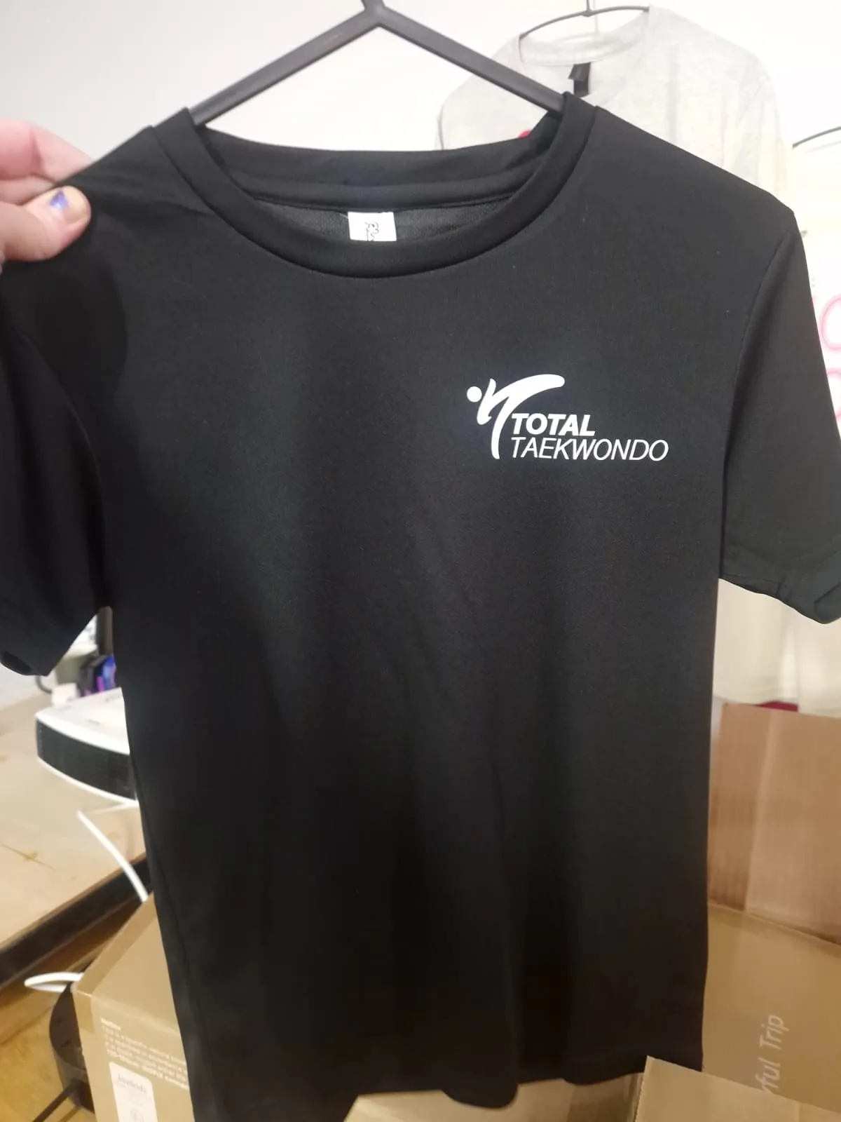 Black t-shirt with white Total Taekwondo chest logo